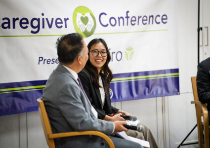 Mei Kameda smiling at Tomohiro J. Kagami