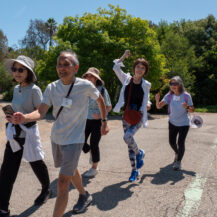 a group of people walking by