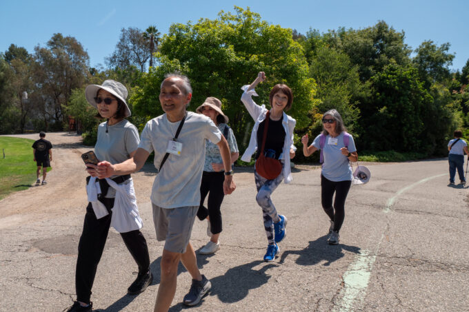 a group of people walking by