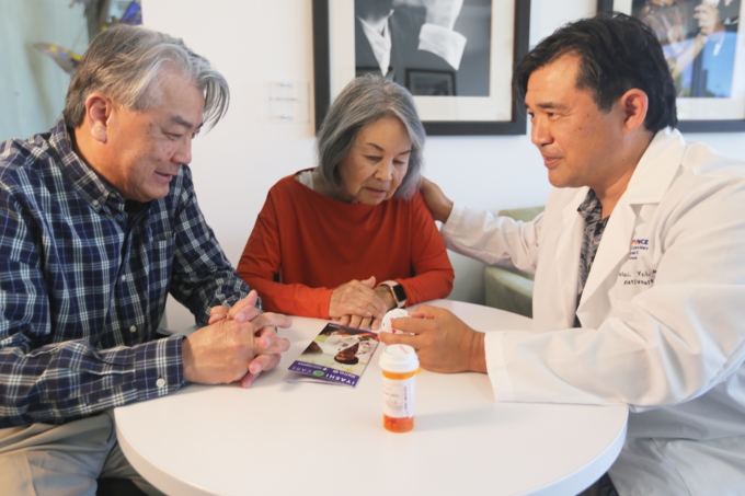 Dr. Yanami talking with two patients