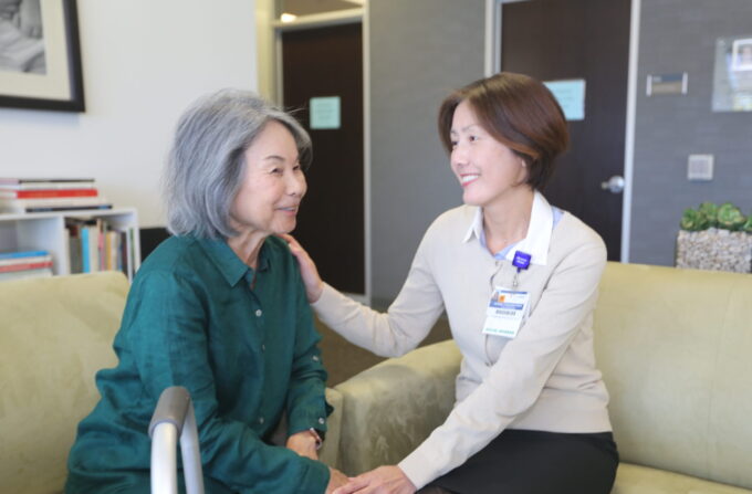 woman talking to Iyashi Care social worker