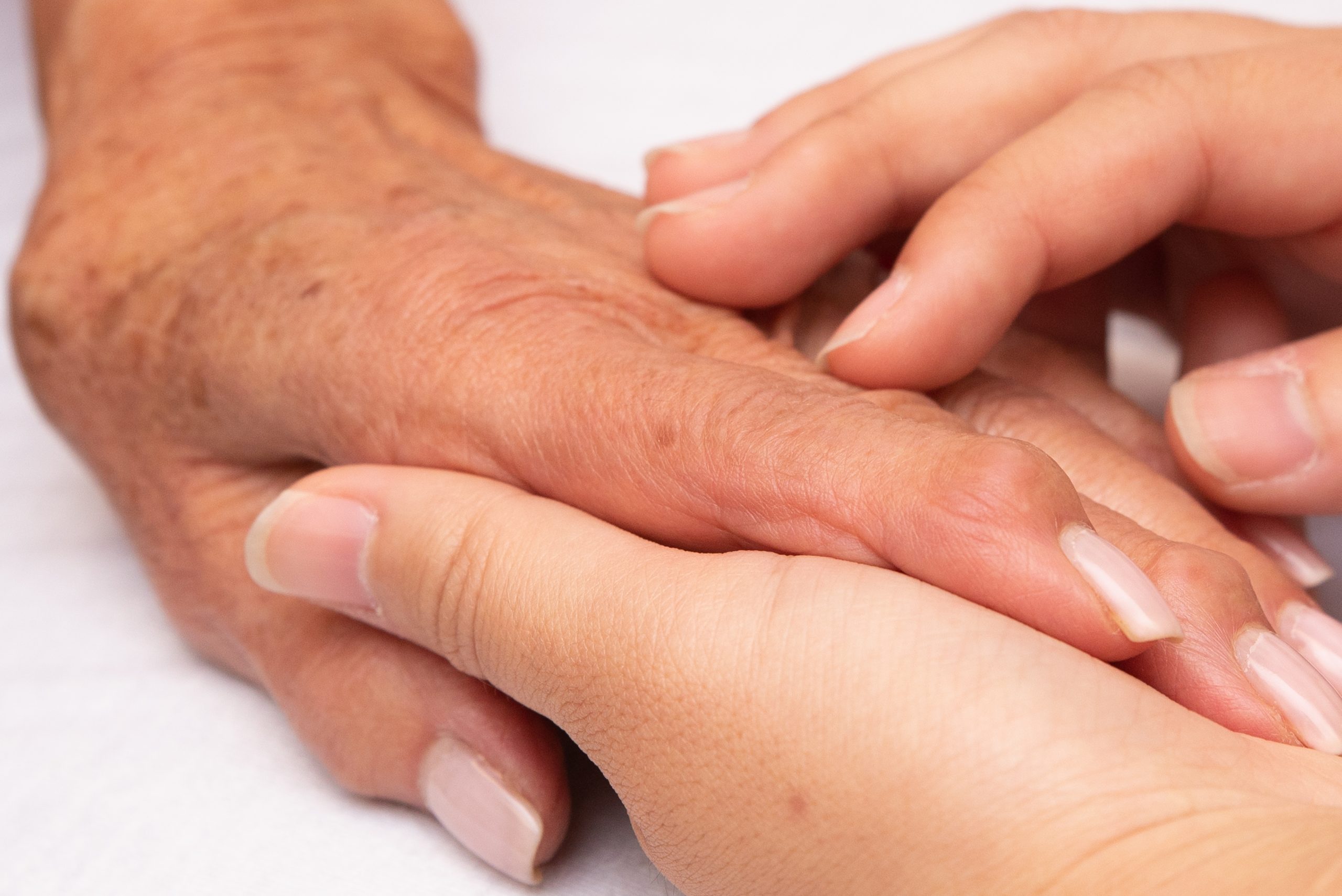hand caring for another hand