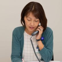 Iyashi care social worker making calls.
