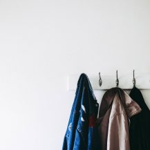 wall with clothing hanging