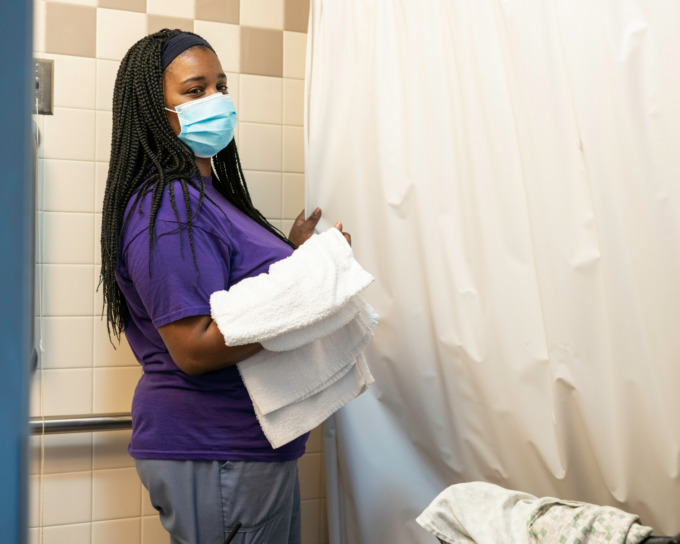caregiver helping with shower