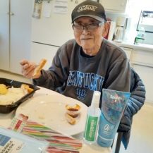 older adult with bento