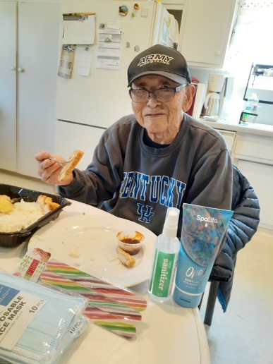 older adult with bento