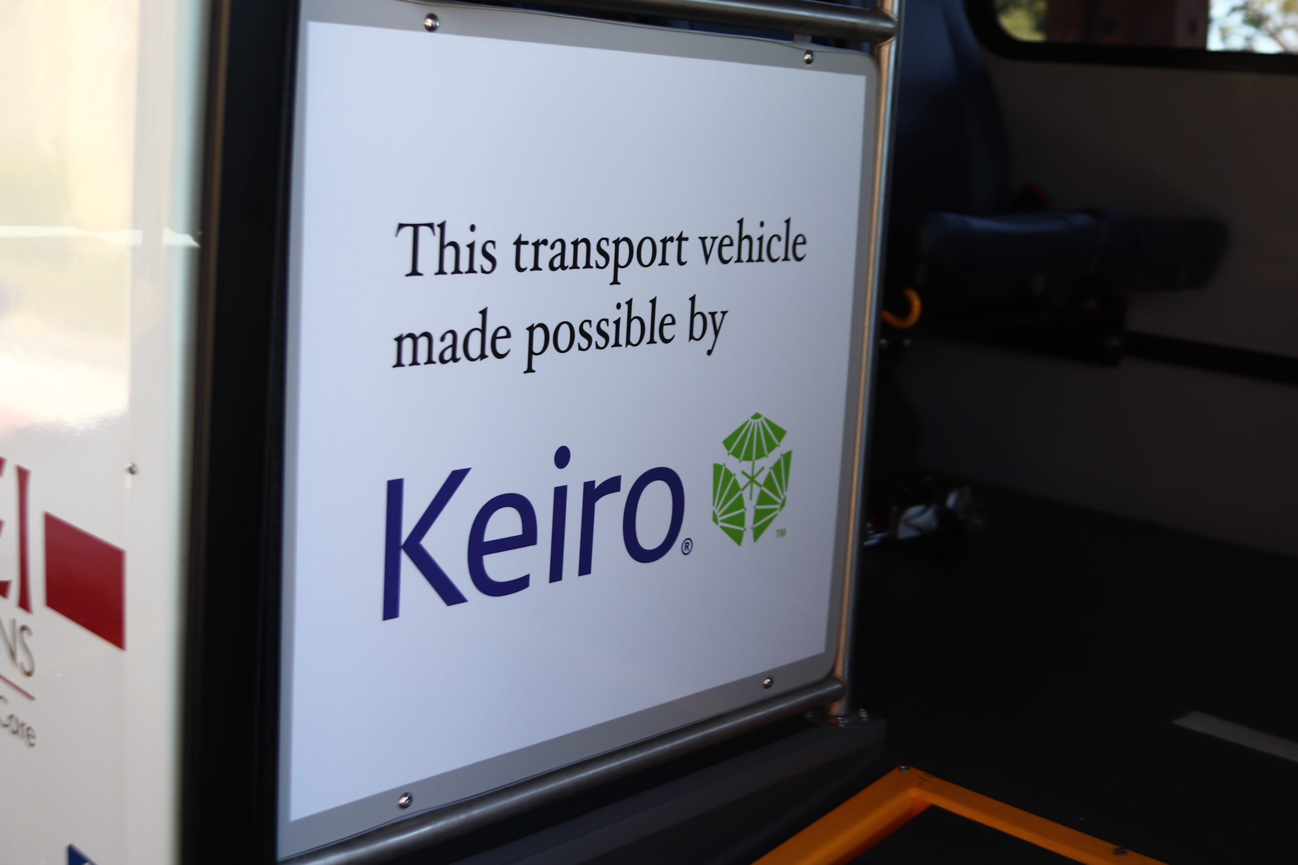 white sign with keiro logo