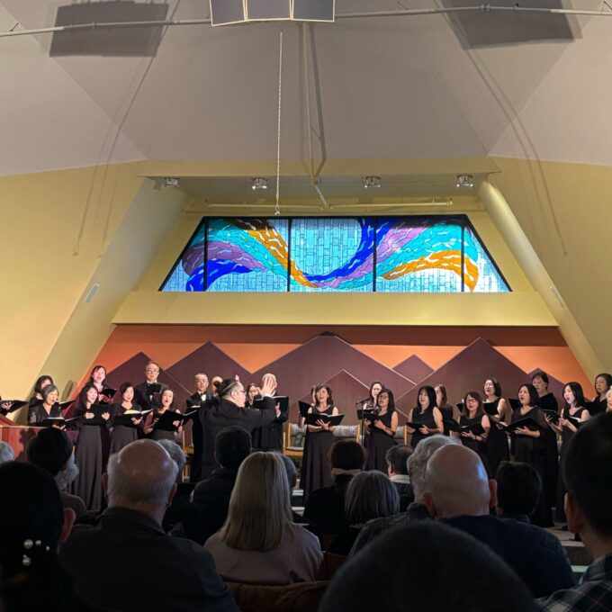 choir group on stage singing