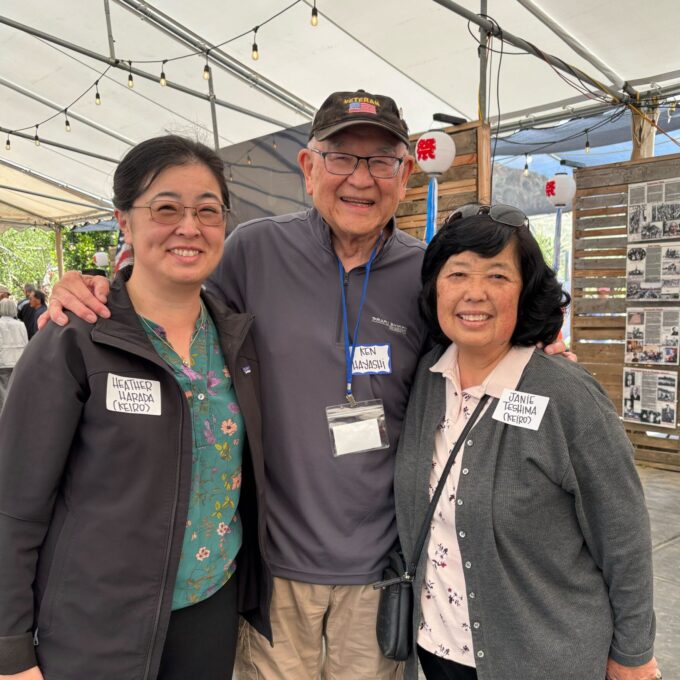 three people smiling