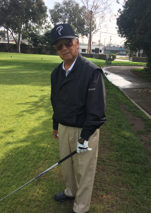 Yosh playing golf