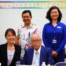 iyashi care team and kitaoka-san smiling to camera