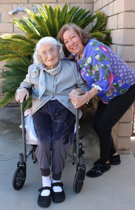 two women posing for photo