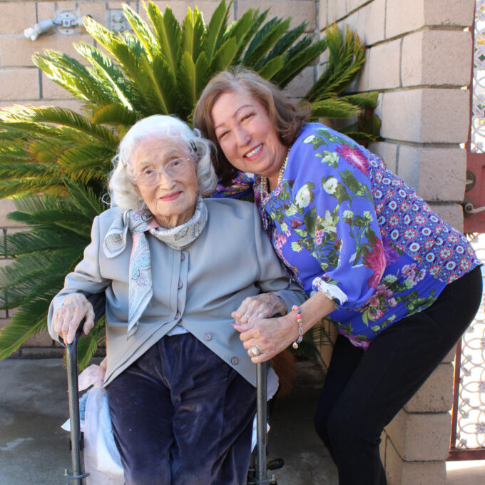 two women posing for photo