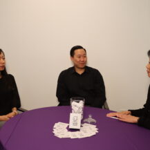 group conversating at purple table