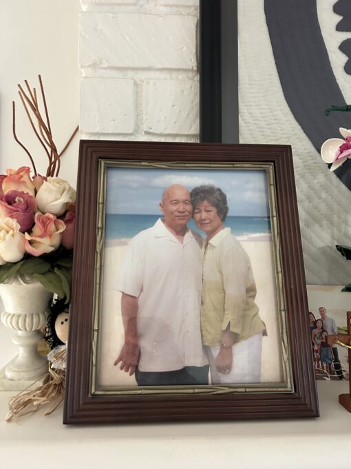 a photo of a man with a woman on a beach