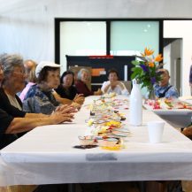 Older adults sitting together at a table