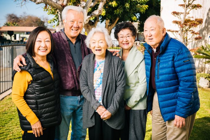 older adults posing for camera