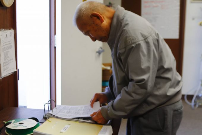 mamoru kanda looking at the publications