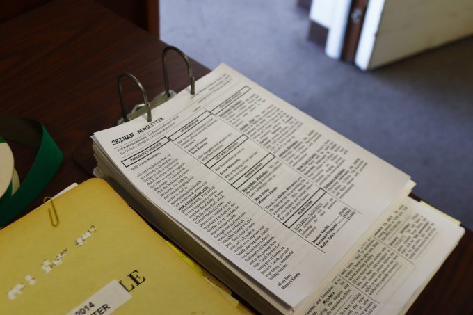 seinan newsletters clipped on a binder
