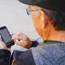man looking at phone