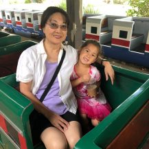 nj and granddaughter smiling