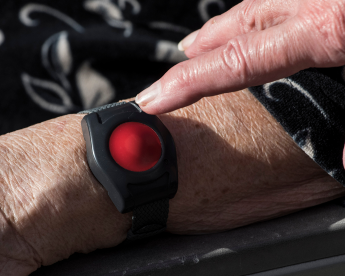 personal emergency response system bracelet on wrist
