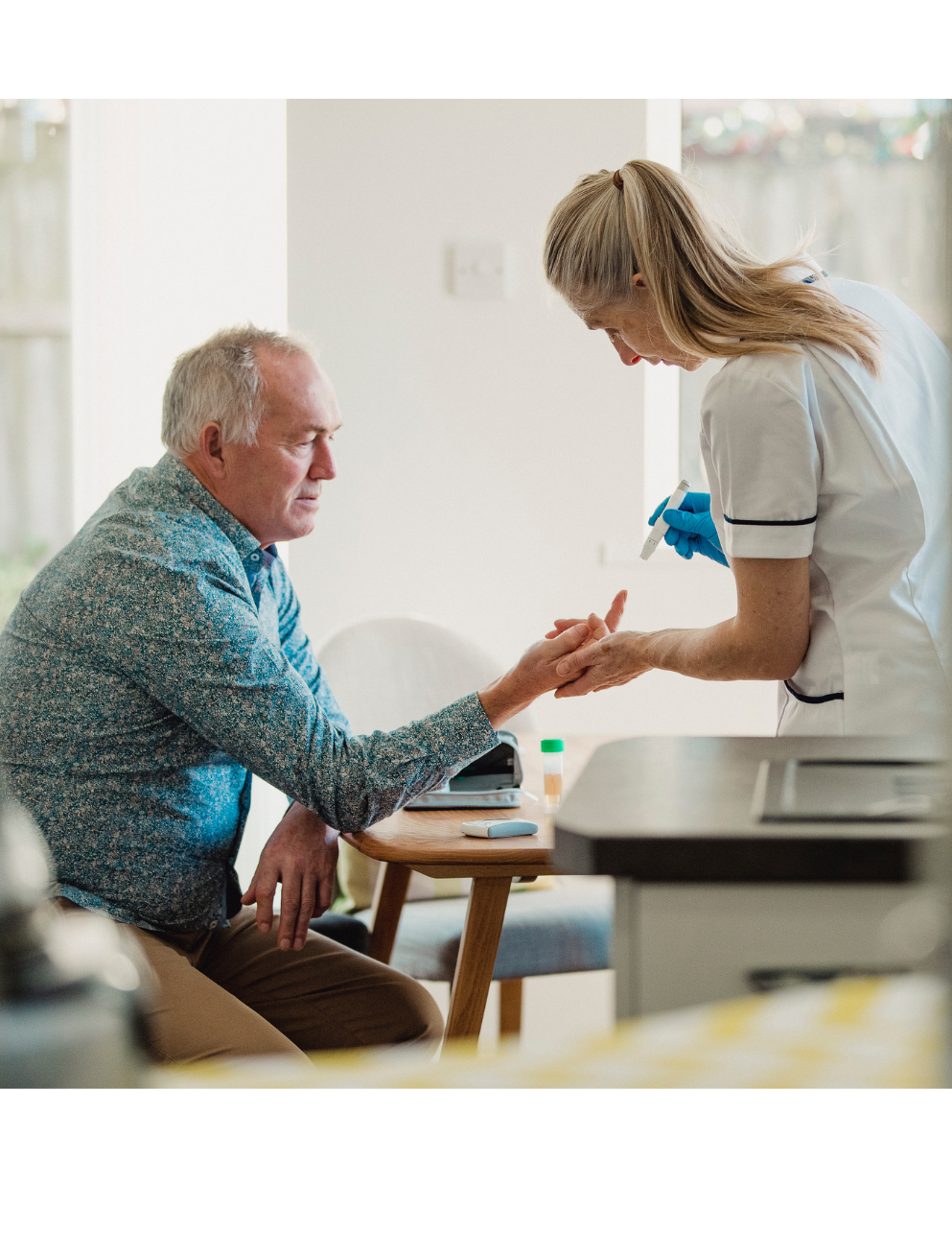nurse helping man with diabetes