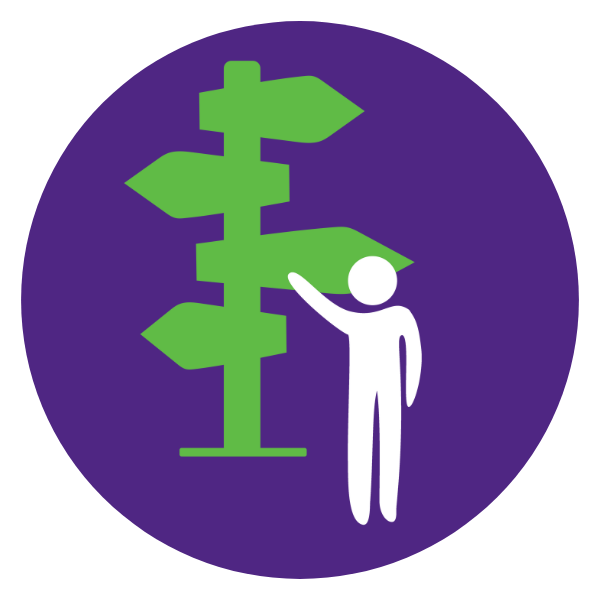 human next to green sign in purple circle