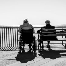 older adults at a bench