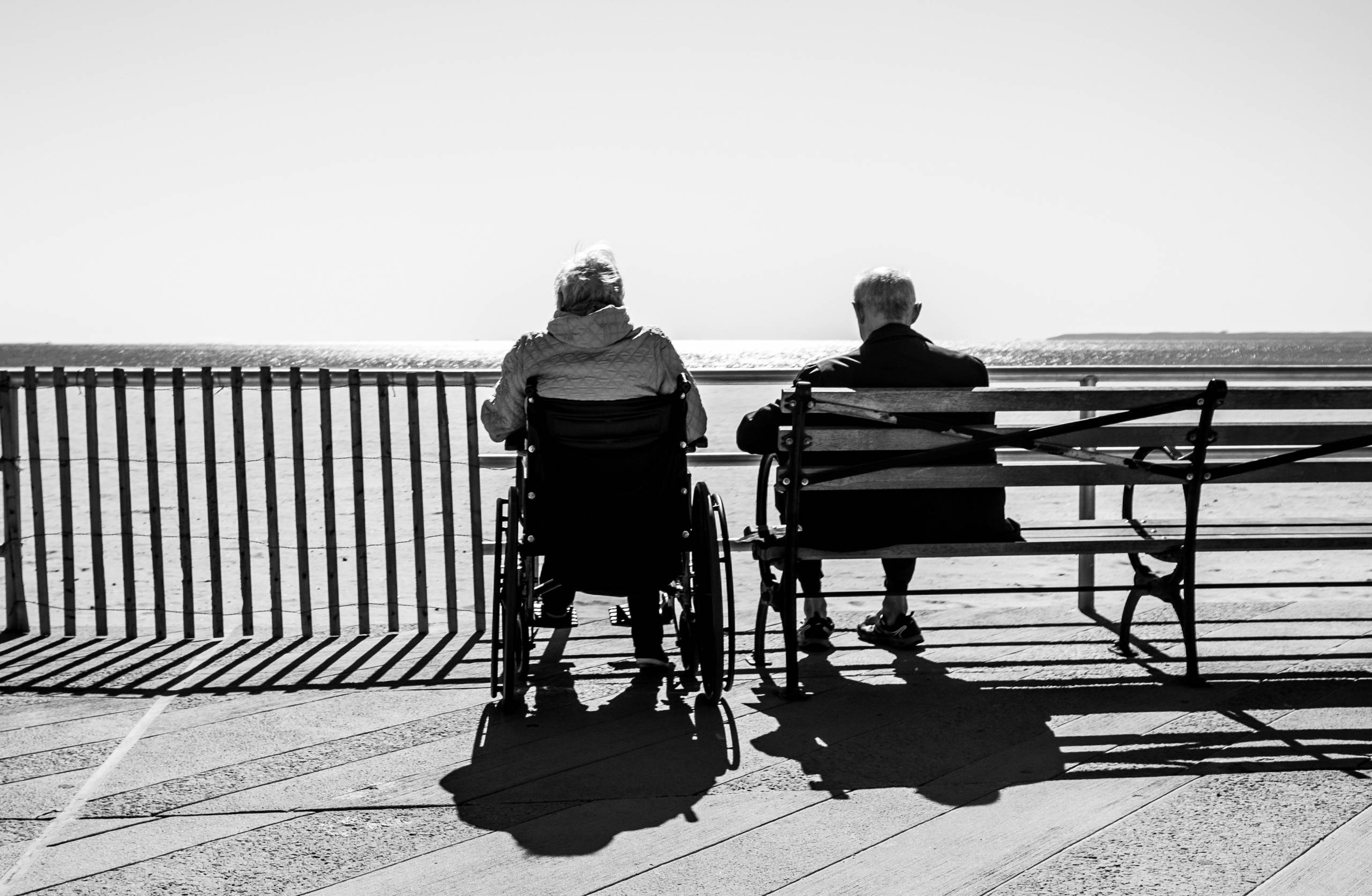 older adults at a bench