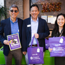 Jack Kurihara, Gerald Iseda, and Lisa Chao holding gift bags