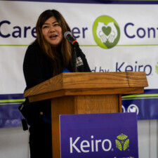 Pearl Omiya talking at podium