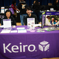 two Keiro staff members at Keiro info table