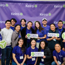 group of volunteers with Keiro backdrop