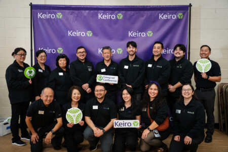 Keiro staff group with Keiro backdrop