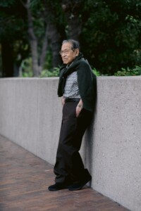 older man looking into the distance posing