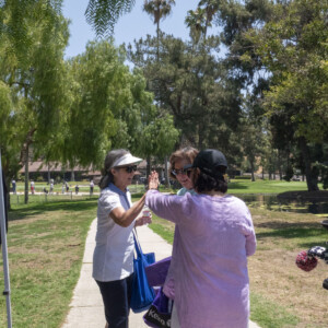 two women high five-ing each other