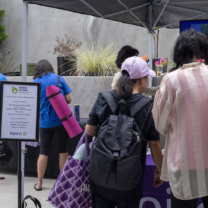 a group of people checking into event