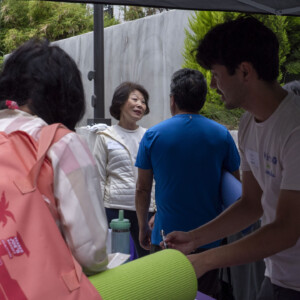 Man attending to an event booth