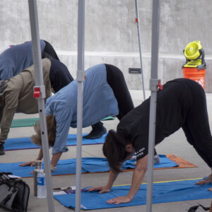 group of people doing yoga