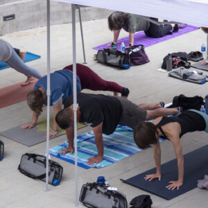 group of people doing yoga