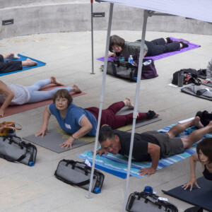 group of people doing yoga