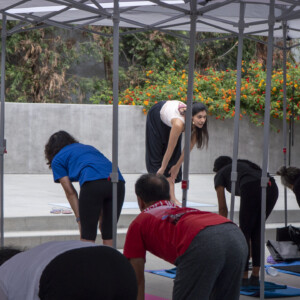 group of people touching their toes