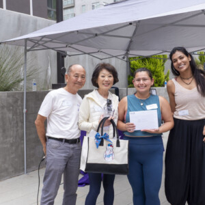 a group photo with a prize