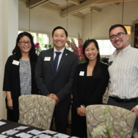 group of four Keiro staff members smiling