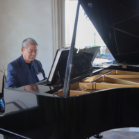 man playing piano