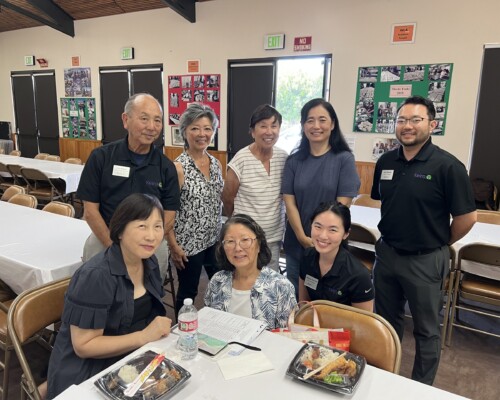 group of people with bentos