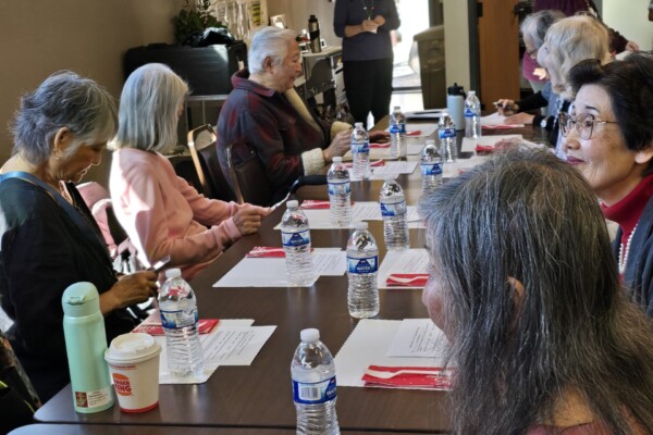 group of people sitting at table