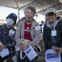 three women smiling